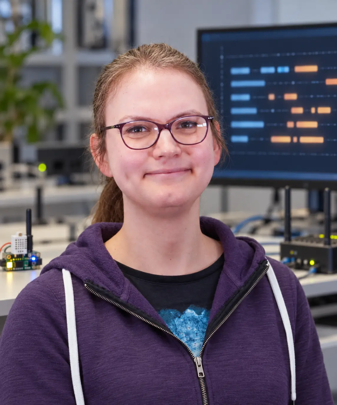 AI editorial portrait of Martine Sophie Lenders in a low-power IoT networking lab.