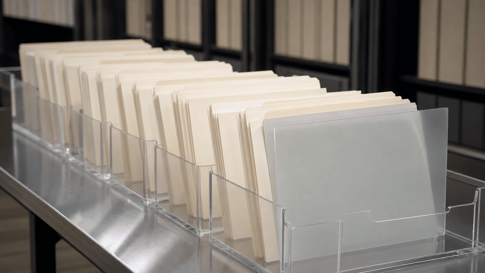Photorealistic institutional archive table with blank folders arranged in transparent trays and one frosted privacy folder at the end, representing WHOIS history and chain-of-control proof.