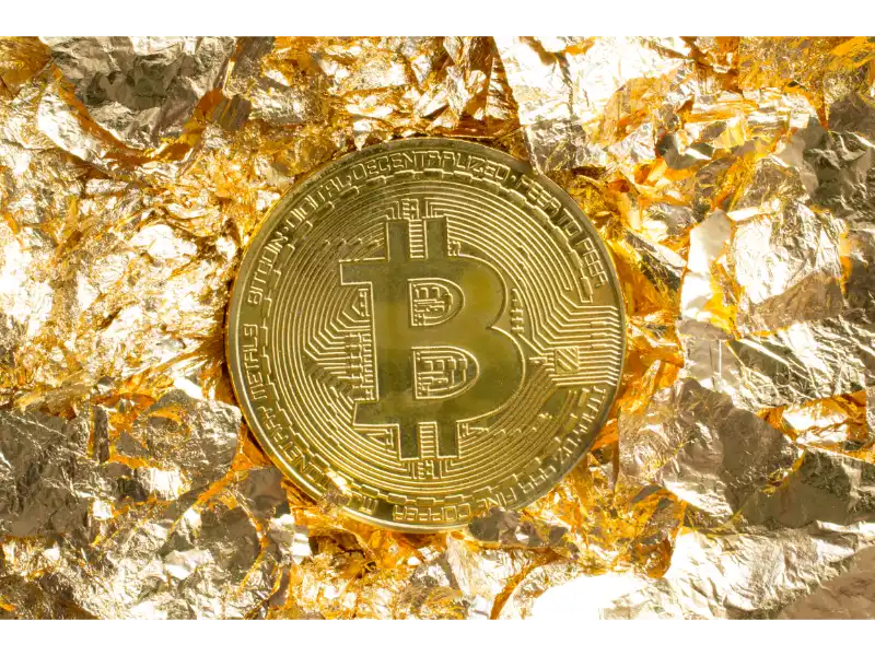 bitcoin-coin-golden-foil-pieces-around-decorative-background