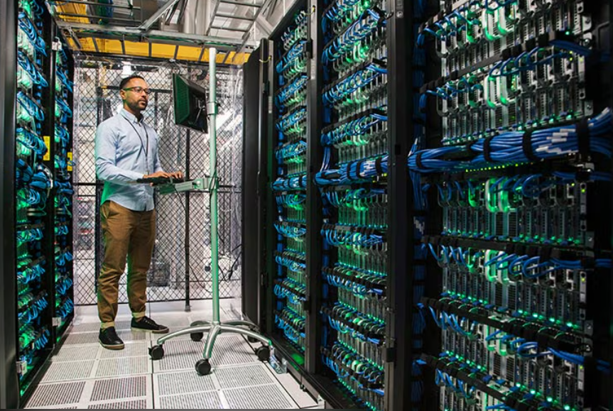 Oracle shares rise after $50 billion data centre funding plan Oracle-Cloud-data-center-interior-with-server-racks-and-cooling-infrastructure